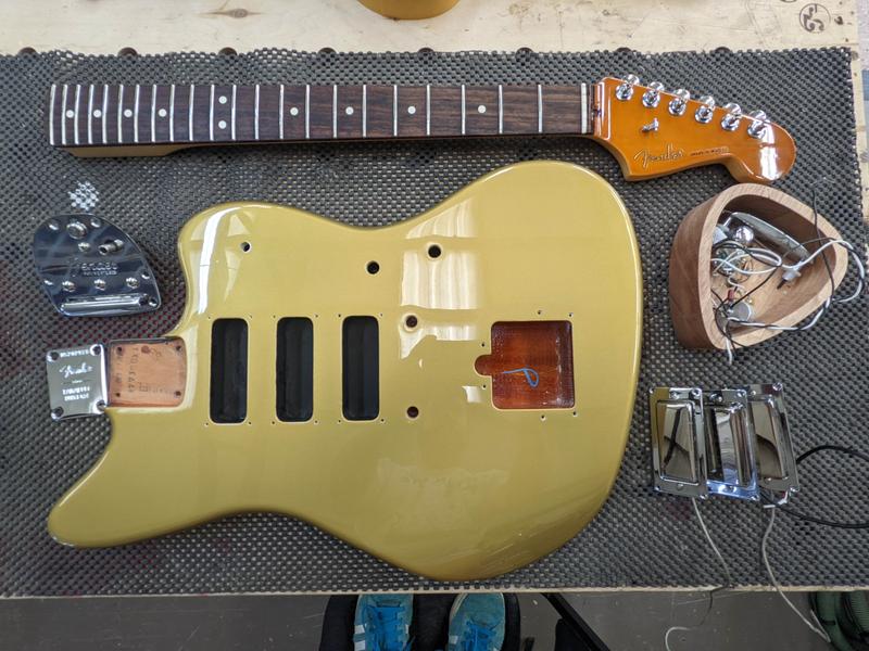 guitar being set up
