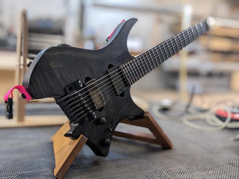 guitar being set up
